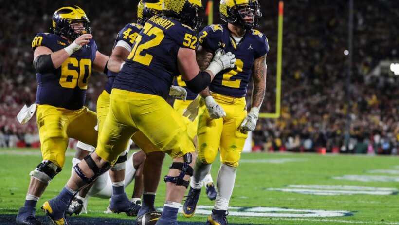 Michigan running back Blake Corum celebrating a touchdown
