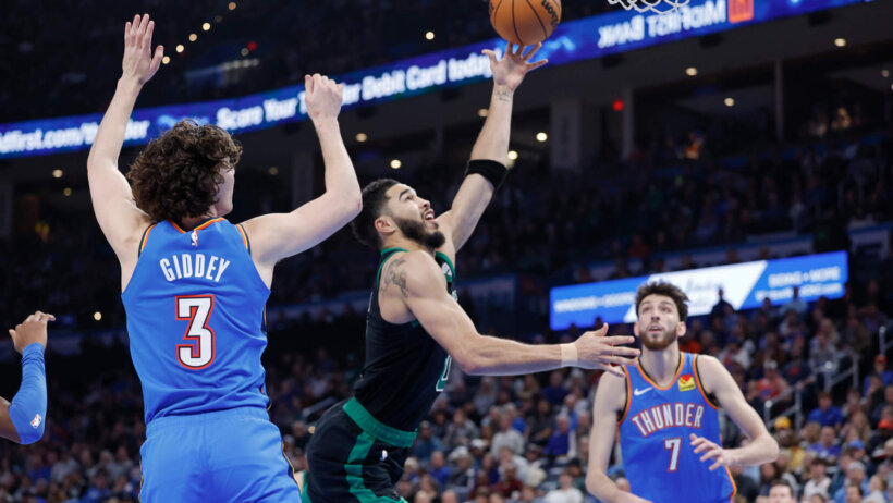 Boston Celtics forward Jayson Tatum goes for a layup against the OKC Thunder