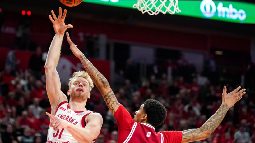 Nebraska Cornhuskers forward Rienk Mast shoots a hook shot over a defender