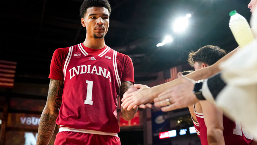 Indiana Hoosiers center Kel'el Ware high-fiving fans