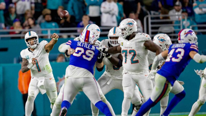 Miami Dolphins quarterback Tua Tagovailoa throwing a pass against the Buffalo Bills