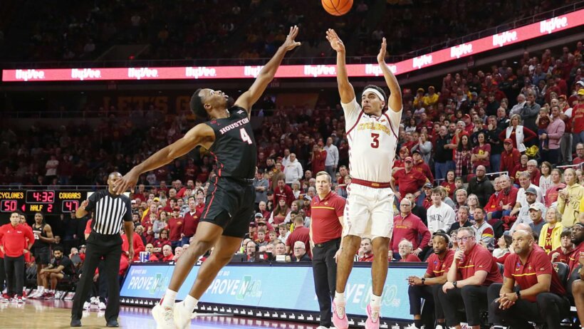 Iowa State Cyclones guard Tamin Lipsey shoots over Houston Cougars guard LJ Cryer