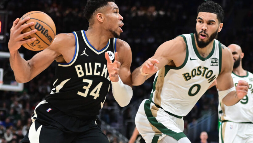Milwaukee Bucks forward Giannis Antetokounmpo drives for the basket against Boston Celtics forward Jayson Tatum