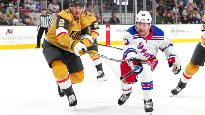 Vegas Golden Knights defenseman Zach Whitecloud slashes New York Rangers left wing Alexis Lafreniere
