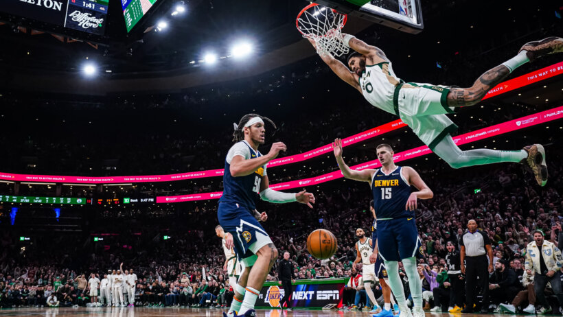 Boston Celtics forward Jayson Tatum dunks against the Denver Nuggets