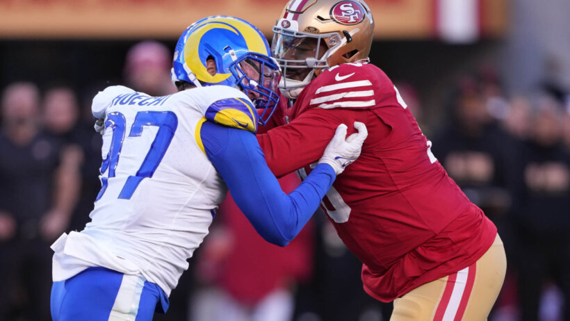 San Francisco 49ers guard Jaylon Moore blocks Los Angeles Rams linebacker Michael Hoecht