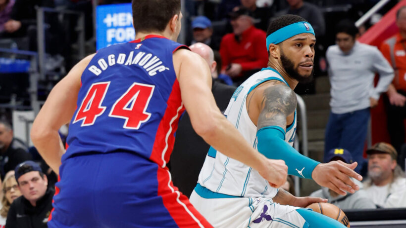 Charlotte Hornets forward Miles Bridges dribbles against Detroit Pistons forward Bojan Bogdanovic