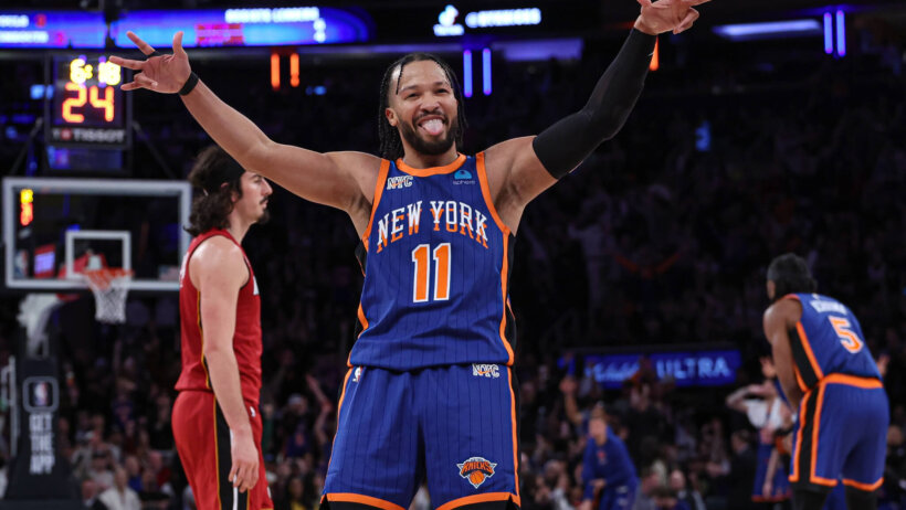 New York Knicks guard Jalen Brunson celebrates a three
