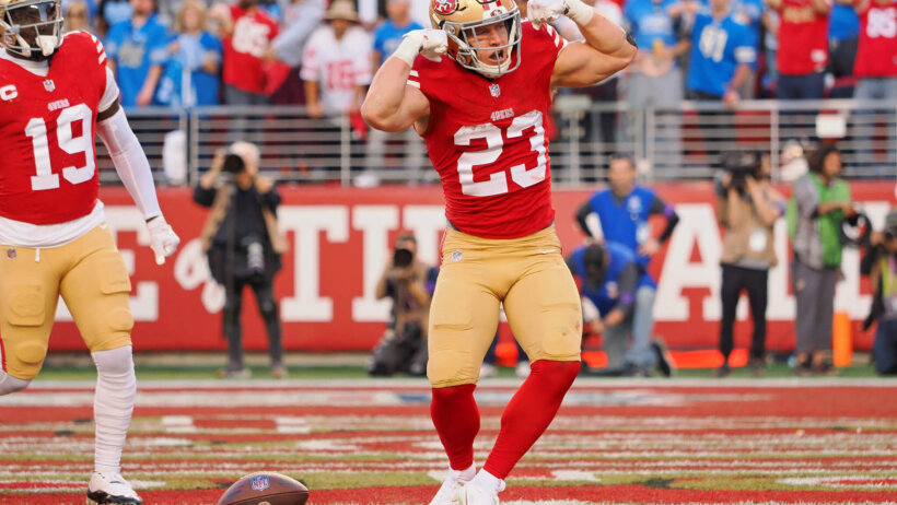 San Francisco 49ers running back Christian McCaffrey flexing