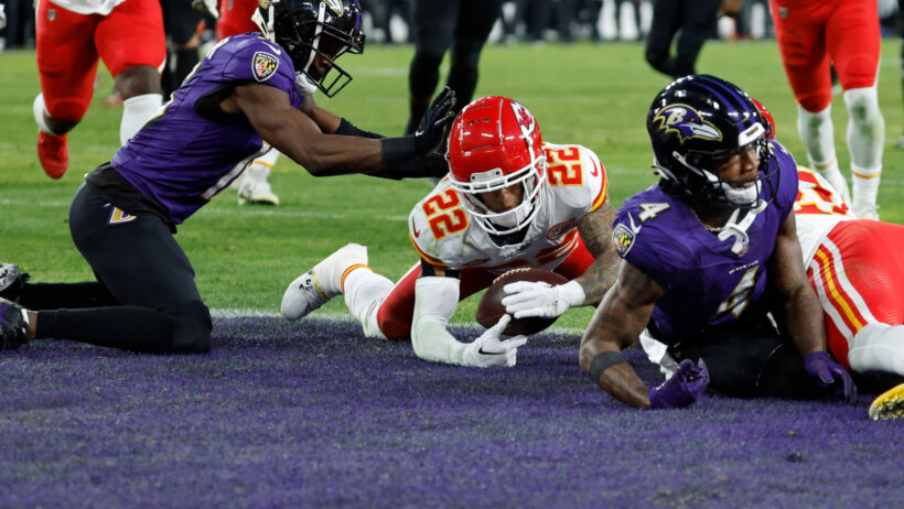 Kansas City Chiefs cornerback Trent McDuffie recovering a fumble in the end zone against the Baltimore Ravens