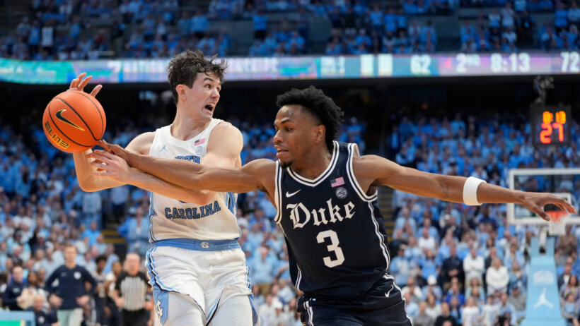 North Carolina Tar Heels guard Cormac Ryan with the ball as Duke Blue Devils guard Jeremy Roach defends