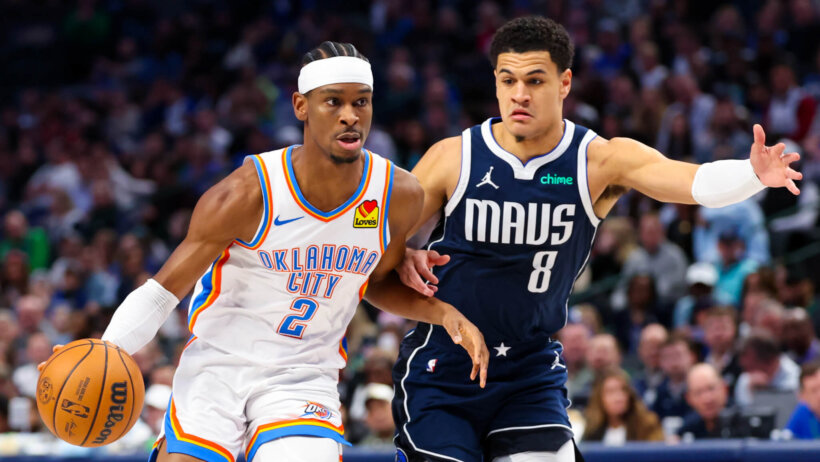 Oklahoma City Thunder guard Shai Gilgeous-Alexander dribbles as Dallas Mavericks guard Josh Green