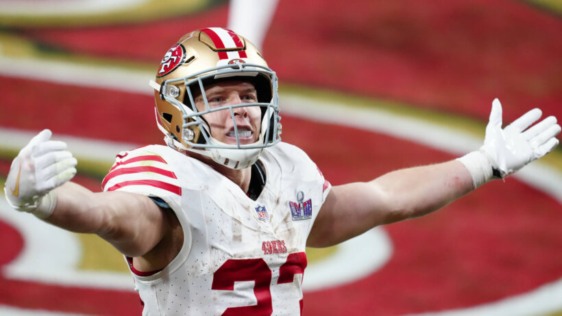Christian McCaffrey celebrates a touchdown in the Super Bowl.