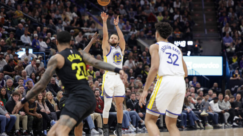 Golden State Warriors guard Stephen Curry shooting a three against the Utah Jazz