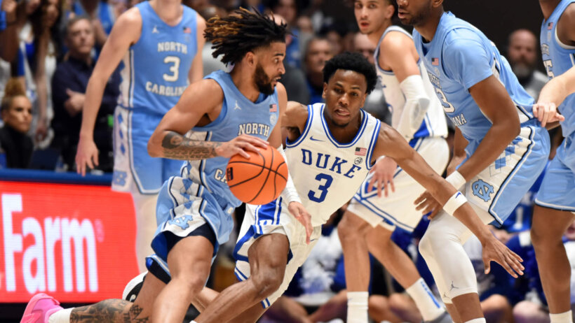 RJ Davis of North Carolina driving to the basket against Duke