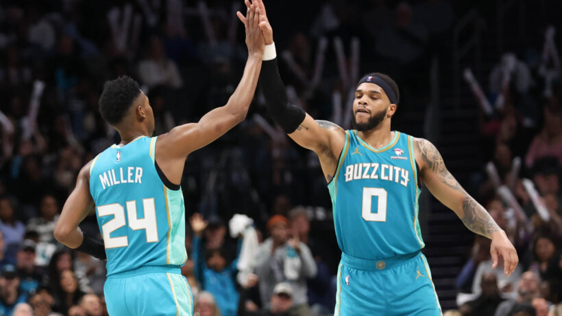 Brandon Miller and Miles Bridges celebrating