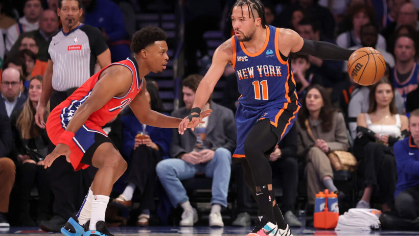 New York Knicks guard Jalen Brunson controls the ball against Philadelphia 76ers guard Kyle Lowry