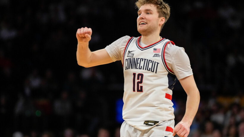 Connecticut Huskies guard Cam Spencer celebrates a basket.