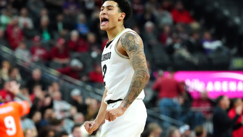 Colorado Buffaloes guard KJ Simpson celebrates a basket