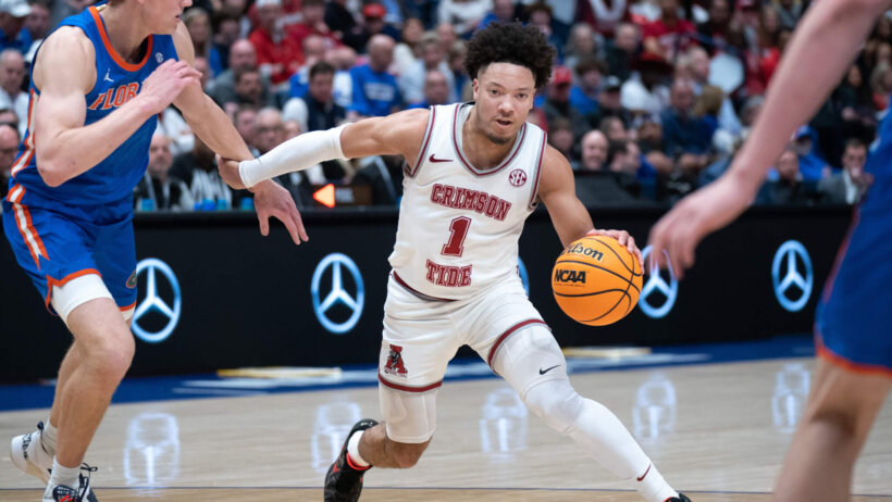 Alabama Crimson Tide guard Mark drives to the basket