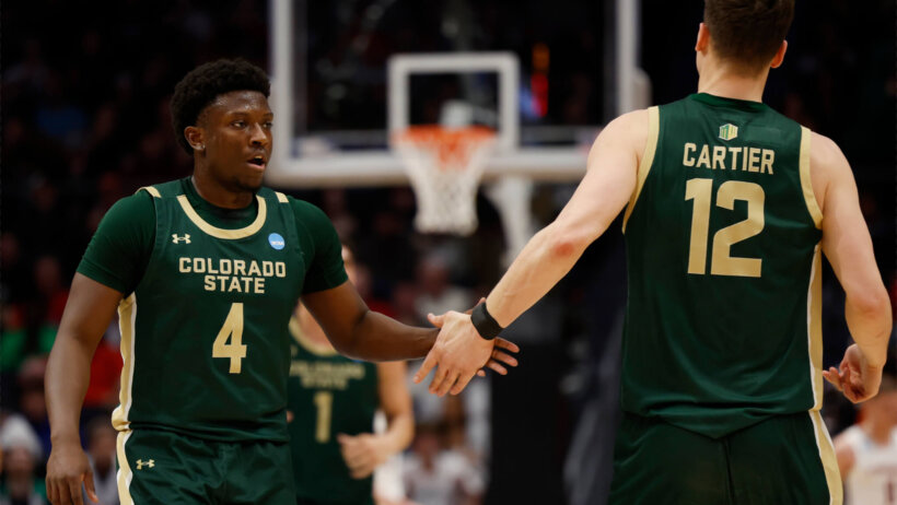 Colorado State Rams guard Isaiah Stevens and forward Patrick Cartier slap hands
