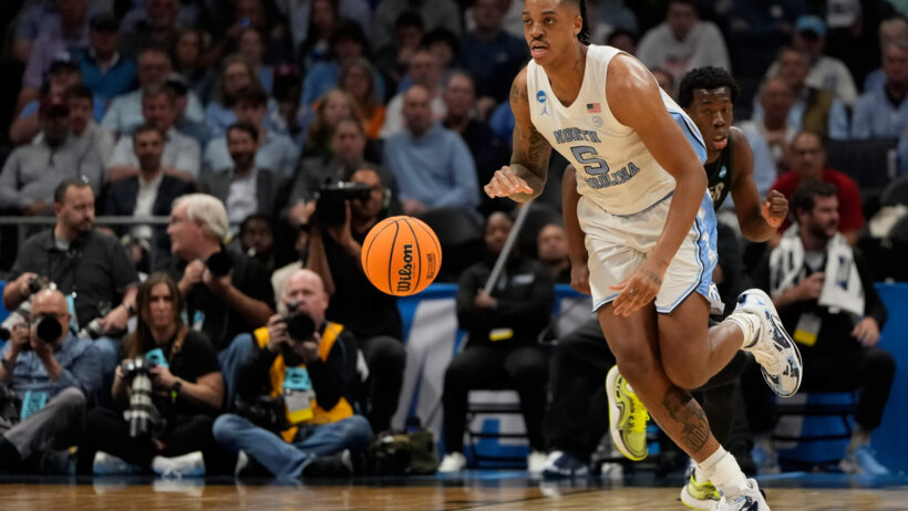 North Carolina Tar Heels forward Armando Bacot dribbling