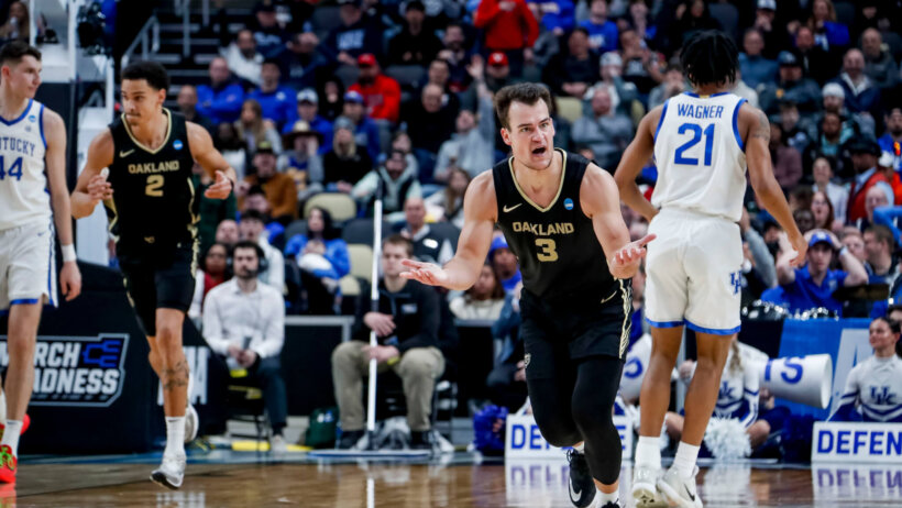 Oakland Golden Grizzlies guard Jack Gohlke celebrates hitting a three