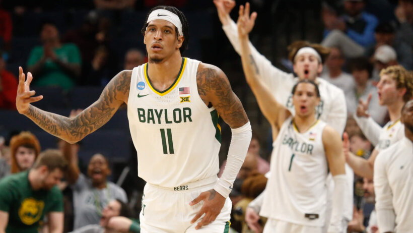 Baylor Bears forward Jalen Bridges celerbates a three