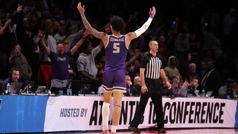James Madison Dukes guard Terrence Edwards Jr pumping up the crowd after a basket