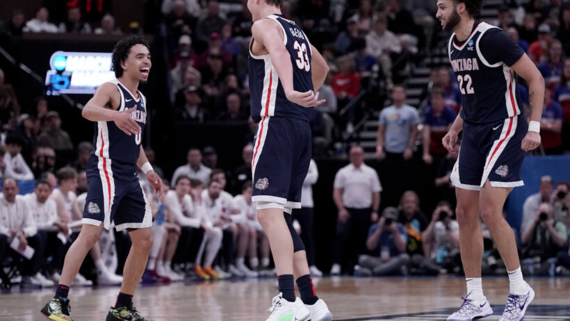 Gonzaga players celebrating a basket against Kansas