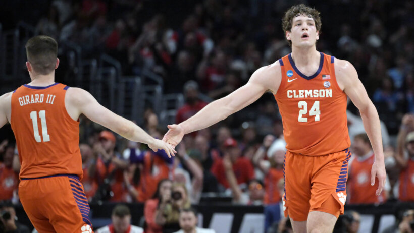 Clemson Tigers center PJ Hall and guard Joseph Girard III