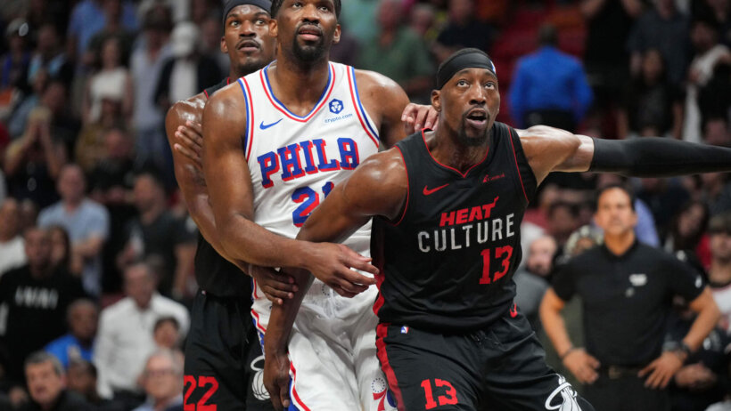 Miami Heat forward Jimmy Butler boxes out Philadelphia 76ers center Joel Embiid