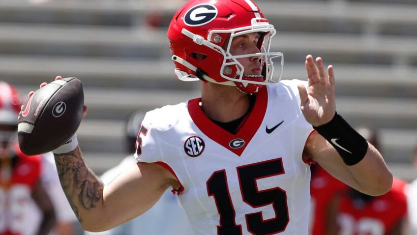 Georgia quarterback Carson Beck throws a pass