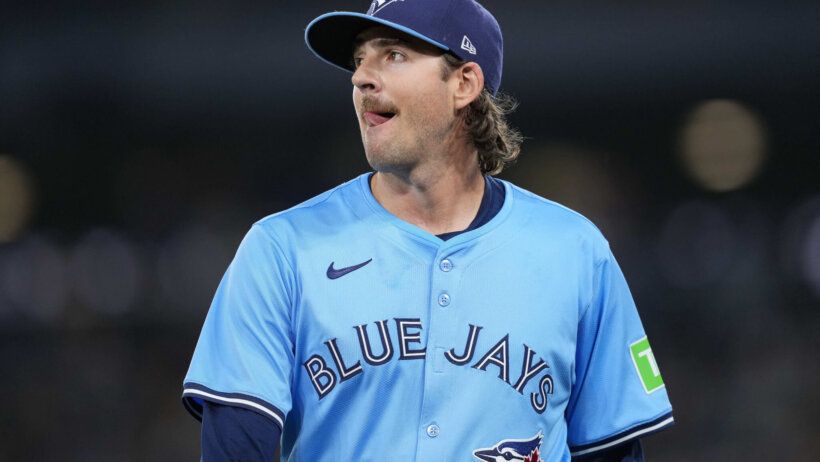 Toronto Blue Jays starting pitcher Kevin Gausman walking off the mound