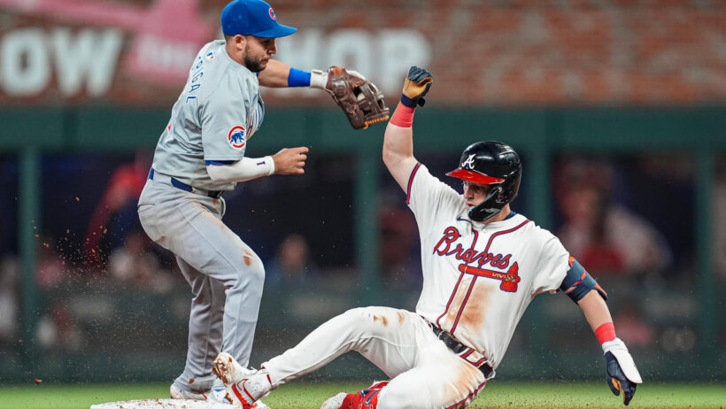 Atlanta Braves third baseman Zack Short sliding into second base against the Chicago Cubs