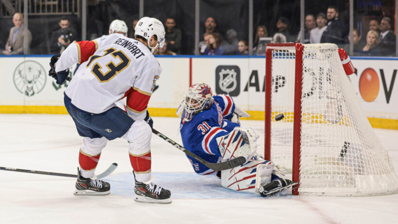 Florida Panthers center Sam Reinhart shoots the puck as New York Rangers goaltender Igor Shesterkin defends during the third period