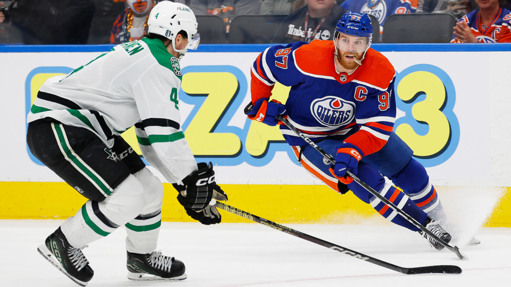Edmonton Oilers forward Connor McDavid makes a move on Dallas Stars defensemen Miro Heiskanen