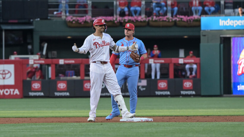 Philadelphia Phillies outfielder Nick Castellanos celebrating on second base after driving in a run