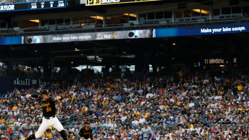 Pittsburgh Pirates starting pitcher Paul Skenes delivering a pitch