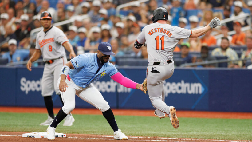 Tampa Bay Rays first baseman Yandy Diaz tagging Baltimore Orioles second baseman Jordan Westburg