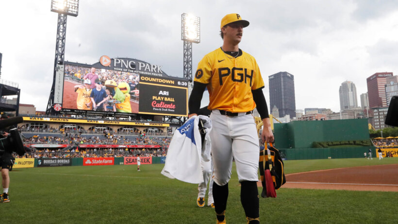 Pittsburgh Pirates starting pitcher Paul Skenes walking off the field