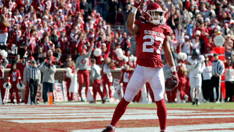 Oklahoma Sooners running back Gavin Sawchuk celebrates after a touchdown