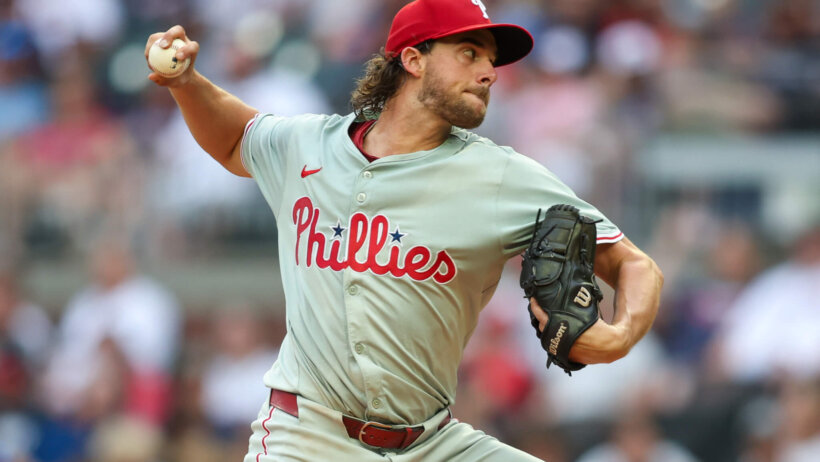 Philadelphia Phillies starting pitcher Aaron Nola throws