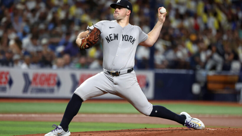 New York Yankees starting pitcher Carlos Rodon throws a pitch