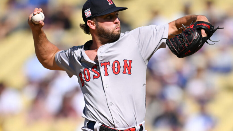 Boston Red Sox pitcher Kutter Crawford throws a pitch