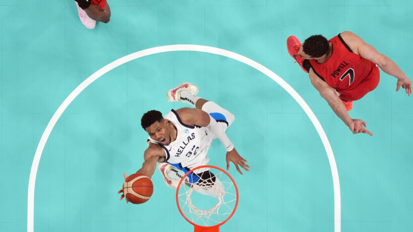 Greece forward Giannis Antetokounmpo shoots a layup against Canada