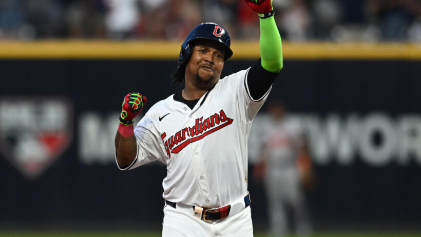Cleveland Guardians third baseman Jose Ramirez (11) rounds the bases after hitting a home run during the seventh inning