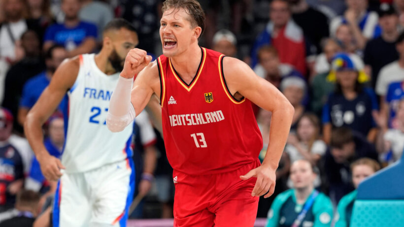 German forward Moritz Wagner celebrates a basket at the 2024 Olympics