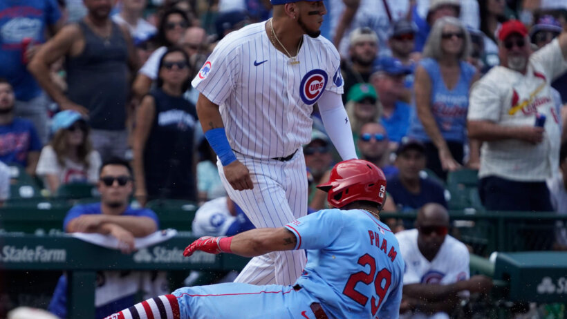St. Louis Cardinals outfielder Tommy Pham slides into third