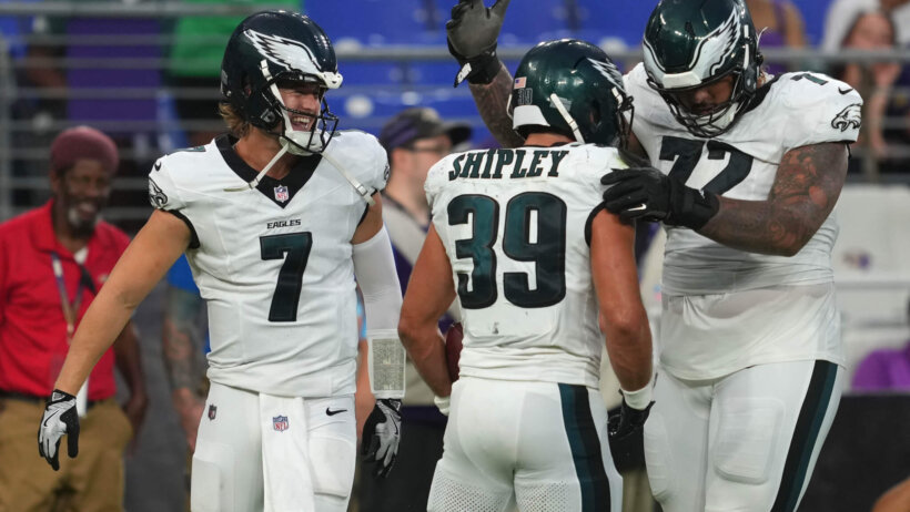 Philadelphia Eagles running back Will Shipley celebrates a TD with quarterback Kenny Pickett and tackle Darian Kinnard